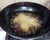 A picture of step 7 of Masala fish fry.