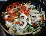 A picture of step 4 of Ramen Noodles with Vegetables and Shrimp.