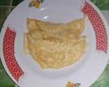 Foto langkah ke 3 dari resep Telur dadar kelapa.