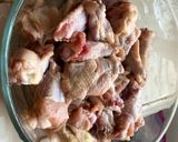 A picture of step 1 of Chicken Arroz Caldo.