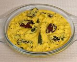 A picture of step 11 of Pazham Kalan-Kerala Ripe Banana Curry (with Phulka) -Sadya Special.