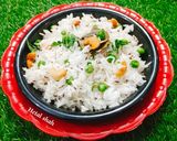 A picture of step 4 of Jeera Matar Pulao (Cumin Pea Rice).
