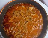 A picture of step 2 of Hungarian Mushroom Paprikash with rice, wild rice, corn and red beans.