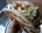 Foto del paso 10 de la receta: Pan🥐 turco relleno con milanesas de berenjena🍆 y calabacín🌮