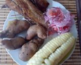 Foto del paso 7 de la receta: Pescado frito acompañado con salsa y choclo papa
