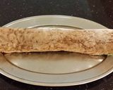A picture of step 24 of Chocolate Cake Roll with Pistachio Cream Filling and Frosting.