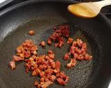 Foto del paso 2 de la receta: Guisantes salteados con jamón y huevo