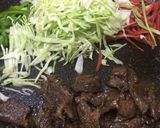 A picture of step 7 of Teppanyaki Beef, Stir Vegetables and Garlic Rice.