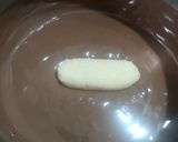 A picture of step 4 of Homemade bounty bar chocolate.