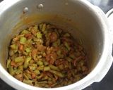 A picture of step 1 of Cluster Beans Cooked in Coconut Milk (Pressure Cooker).