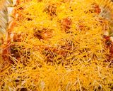 A picture of step 7 of Baked Beef and Potato Burritos.