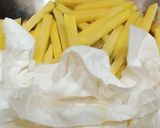 A picture of step 3 of Chessy pizza fries.