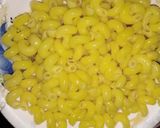 A picture of step 7 of Koila chicken with white pasta.