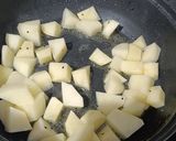 A picture of step 2 of Aloo Posto.