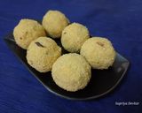 A picture of step 5 of Rava besan dry fruit laddu.