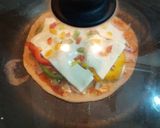 A picture of step 5 of Thin Crust Paneer Pizza.