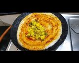A picture of step 11 of Schezwan Cheese Dosa.