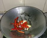 Foto langkah ke 1 dari resep Oseng Cumi Sambel Kemangi.