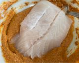 A picture of step 4 of Tandoori Cod with Wilted Spinach.