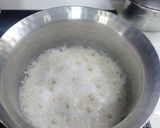A picture of step 1 of Zeera baghar rice.