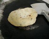 A picture of step 4 of Hummus with whole wheat pita bread and tomato chutney.