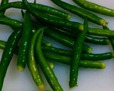 A picture of step 1 of Rajasthani Mirchi Ka Kutta.