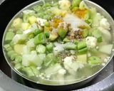 A picture of step 5 of Steamed coconut rice Noodles with vegetables kurma.