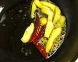 A picture of step 2 of Green Mango Chicken Curry.