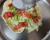 A picture of step 3 of Masala papad or salad on papad.