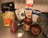 A picture of step 1 of Peanut butter and jelly Overnight oats.