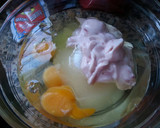 Foto del paso 3 de la receta: Bizcochuelo de yogur y frutos secos