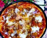A picture of step 8 of Chicken tikka pizza.