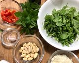 A picture of step 1 of Arugula, Cherry Tomato, and Almond Pesto.