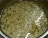 A picture of step 1 of Masala macaroni.