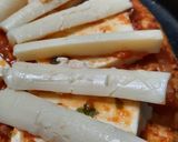 Foto del paso 4 de la receta: Pizza con mejillones, palmitos, jamón