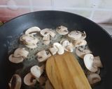 A picture of step 3 of Cheesy Mushroom French Fries.