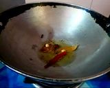 A picture of step 2 of Bashonti Pulao r Chicken Kosha.