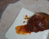A picture of step 6 of Cheesy pizza sauce paratha.