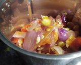 A picture of step 3 of Chole ragda with potato pattice.