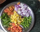 A picture of step 2 of Moongdaal pizza with peas.