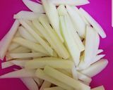 A picture of step 2 of Masala fries.