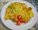 Foto langkah ke 1 dari resep Telur Dadar Tomat.