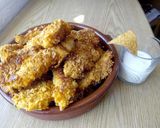 Foto del paso 4 de la receta: Pollo rebozado con Doritos