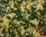 A picture of step 2 of Dambun couscous with moring leaves and carrot.
