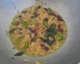 A picture of step 3 of Kande (onion) pohe.