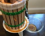 A picture of step 8 of 8 litres juice from 28 litres bucket full of apples.