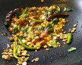 A picture of step 9 of Lemon Rice With Masala curd.