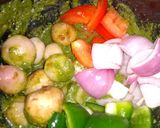 A picture of step 2 of Aloo hariyali tikka.