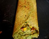 A picture of step 3 of Moong chilla with stuffing.