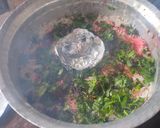 A picture of step 5 of Smokey tandoori chicken drumsticks biryani with mint mango raita.